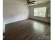 The bedroom has lots of space and a ceiling fan at 3012 Longspur Dr, Matthews, NC 28105