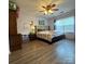 Spacious bedroom with ample closet space and natural light; serene and inviting at 3012 Longspur Dr, Matthews, NC 28105
