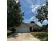 Charming one-story home featuring an attached garage and well-maintained front yard at 3012 Longspur Dr, Matthews, NC 28105