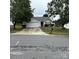 Charming single-story home with a large front yard and driveway at 3012 Longspur Dr, Matthews, NC 28105