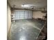 Spacious two-car garage with plenty of room for vehicles and storage at 3012 Longspur Dr, Matthews, NC 28105