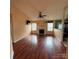 Bright living room with hardwood floors and fireplace, perfect for entertaining at 3012 Longspur Dr, Matthews, NC 28105