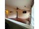 Spacious living area with vaulted ceilings, cozy fireplace, and laminate flooring at 3012 Longspur Dr, Matthews, NC 28105