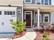 Inviting front porch with brick accents and manicured landscaping at 3023 Ballester Rd, Fort Mill, SC 29707