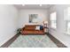 Cozy living room featuring a comfortable sofa and a decorative rug at 3023 Ballester Rd, Fort Mill, SC 29707