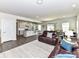 Open concept living room with views to kitchen and dining areas at 3023 Ballester Rd, Fort Mill, SC 29707