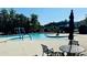 Community pool featuring a splash fountain and ample seating for relaxation at 3023 Ballester Rd, Fort Mill, SC 29707