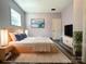 Bedroom with natural lighting, wood floors, and a comfortable, inviting space at 345 Mountain View St, Gastonia, NC 28052
