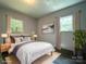 Bedroom with a comfortable bed, ample lighting, and stylish décor in a serene setting at 345 Mountain View St, Gastonia, NC 28052