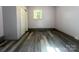 Bedroom with wood floors and neutral paint, offering a clean and bright space at 345 Mountain View St, Gastonia, NC 28052