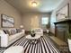 Comfortable living room featuring a fireplace, sleek furniture, and stylish decor at 345 Mountain View St, Gastonia, NC 28052