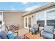The deck features cozy seating, perfect for relaxing and enjoying the outdoors at 3844 Cheyney Park Dr, Charlotte, NC 28269