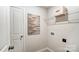 Functional laundry room with shelving, neutral paint, and essential hookups, ready for appliances at 3844 Cheyney Park Dr, Charlotte, NC 28269