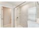 Modern bathroom featuring a glass shower with marble tile, chrome fixtures, and a sleek design at 3936 Cheyney Park Dr, Charlotte, NC 28269