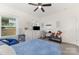 Comfortable bedroom with a ceiling fan and lots of natural light from the window and nice decor at 40154 Crooked Stick Dr, Lancaster, SC 29720