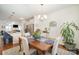 Open concept dining room features hardwood floors and an easy flow to the kitchen and living areas at 40154 Crooked Stick Dr, Lancaster, SC 29720