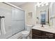 A clean bathroom featuring a vanity and toilet with a shower/tub combination at 5011 Sharon Rd # Q, Charlotte, NC 28210