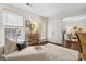 Bright and airy living room with a comfortable sofa and access to the outdoors at 5011 Sharon Rd # Q, Charlotte, NC 28210