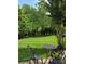 Beautifully manicured backyard with plush green grass at 6017 Lowergate Dr, Waxhaw, NC 28173