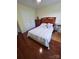 Bedroom with hardwood floors, closet and neutral walls at 6017 Lowergate Dr, Waxhaw, NC 28173