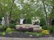 Stonegate Swim & Play community entrance with manicured landscaping and signage for a welcoming neighborhood feel at 6017 Lowergate Dr, Waxhaw, NC 28173