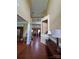 Bright foyer with soaring ceilings and hardwood floors leads into the living spaces at 6017 Lowergate Dr, Waxhaw, NC 28173