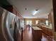 Well-equipped kitchen with granite countertops, stainless steel appliances, and an island at 6017 Lowergate Dr, Waxhaw, NC 28173