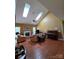 Spacious living room with vaulted ceilings, fireplace, and beautiful hardwood floors at 6017 Lowergate Dr, Waxhaw, NC 28173