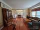 Spacious living room with hardwood floors and views to the entry way at 6017 Lowergate Dr, Waxhaw, NC 28173
