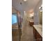 Bright bathroom with double vanities, and a glass shower at 6017 Lowergate Dr, Waxhaw, NC 28173