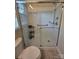 Glass-enclosed shower with seat and modern fixtures at 6017 Lowergate Dr, Waxhaw, NC 28173