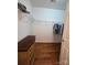 Walk-in closet featuring lots of shelving, a dresser, and hardwood floors at 6017 Lowergate Dr, Waxhaw, NC 28173