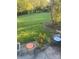 Landscaped yard with flowerpots and green lawn at 6017 Lowergate Dr, Waxhaw, NC 28173