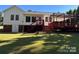 Backyard of a two-story home with a large deck and stairs at 625 Wildwood Dr, Rock Hill, SC 29730