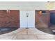 Basement entrance with brick wall and double doors at 625 Wildwood Dr, Rock Hill, SC 29730