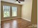 Bedroom featuring a ceiling fan and two bright windows at 625 Wildwood Dr, Rock Hill, SC 29730