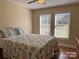 Bedroom with a bed, ceiling fan, and two large windows at 625 Wildwood Dr, Rock Hill, SC 29730