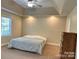 Serene bedroom with tray ceiling, natural light, and neutral carpeting at 625 Wildwood Dr, Rock Hill, SC 29730