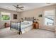 Comfortable bedroom with cozy bedding and plenty of natural light at 6512 Porterfield Rd, Charlotte, NC 28226