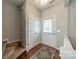 Inviting entryway features hardwood floors, a coat closet, and access to the staircase and main living area at 6917 Rothchild Dr, Charlotte, NC 28270