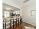 Open-concept kitchen with stainless steel appliances, granite counters, and a breakfast bar with stylish seating at 6917 Rothchild Dr, Charlotte, NC 28270