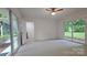 Sunroom with white walls and lots of light at 7021 Linda Lake Dr, Charlotte, NC 28215