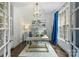 Bright home office features stylish decor, including a modern desk and a blue accent wall at 706 Evans Manor Dr, Weddington, NC 28104