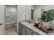 Well-appointed bathroom featuring granite countertops, stylish fixtures, and a shower-tub combination at 710 Olde England Dr, Lincolnton, NC 28092