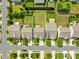 Aerial view of a home in a residential neighborhood showing lot lines and approximate acreage at 7316 Hamilton Bridge Rd, Charlotte, NC 28278