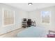 Comfortable bedroom with two large windows, a workspace, and a soft, inviting bed at 7316 Hamilton Bridge Rd, Charlotte, NC 28278