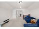 Bright bonus room offering a comfortable seating area and potential for versatile use with neutral decor at 7316 Hamilton Bridge Rd, Charlotte, NC 28278