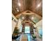 Bright kitchen featuring custom cabinets, an island, and a vaulted, beamed, wood ceiling at 762 Highway 274 Hwy, Clover, SC 29710