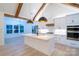 Bright kitchen with white cabinets, stainless steel appliances, and an island, with a view to the dining area at 762 Highway 274 Hwy, Clover, SC 29710