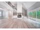 Spacious living room with fireplace, high ceilings, and sliding glass doors to deck at 762 Highway 274 Hwy, Clover, SC 29710